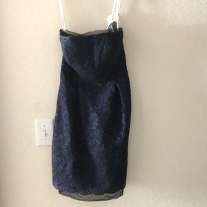 Short navy dress that is laced